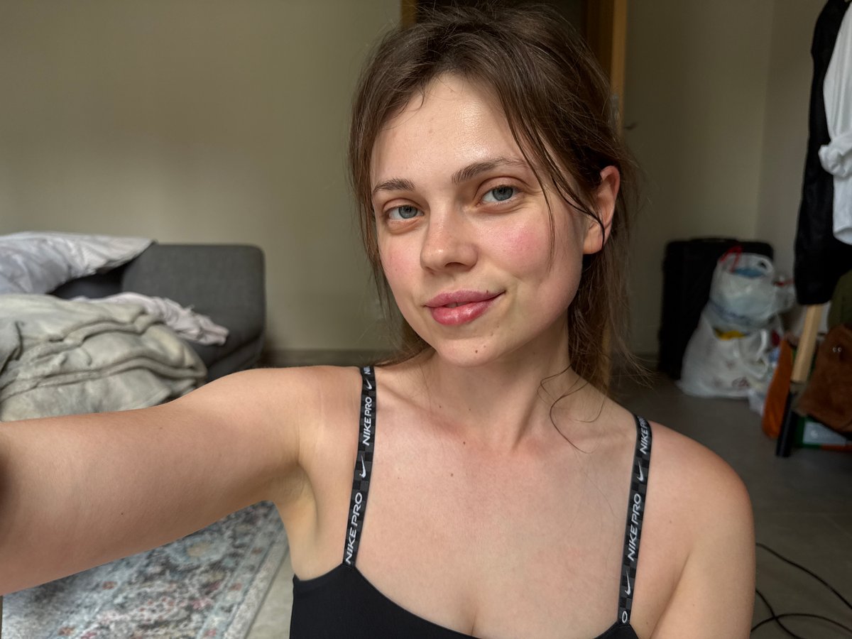 Woman completes indoor yoga session in Karlovy Vary apartment