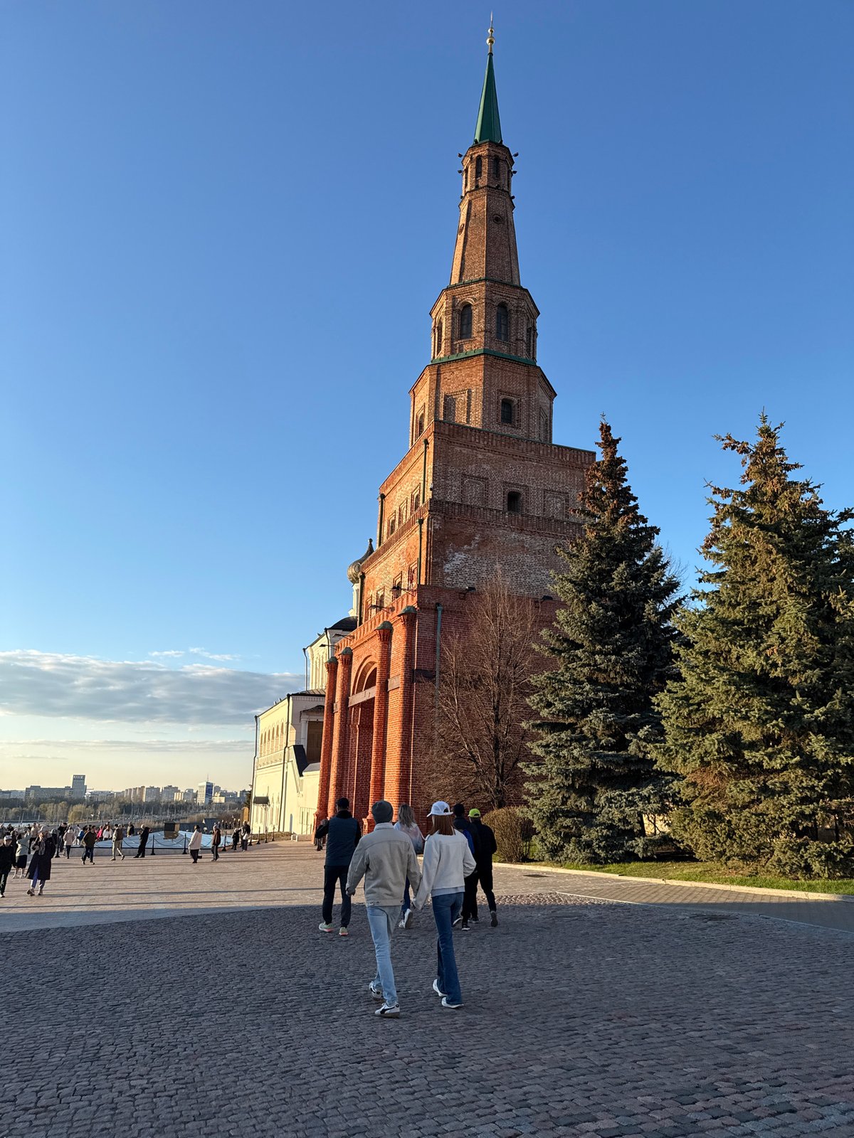 Tourists visit historic Kazan Kremlin on spring afternoon