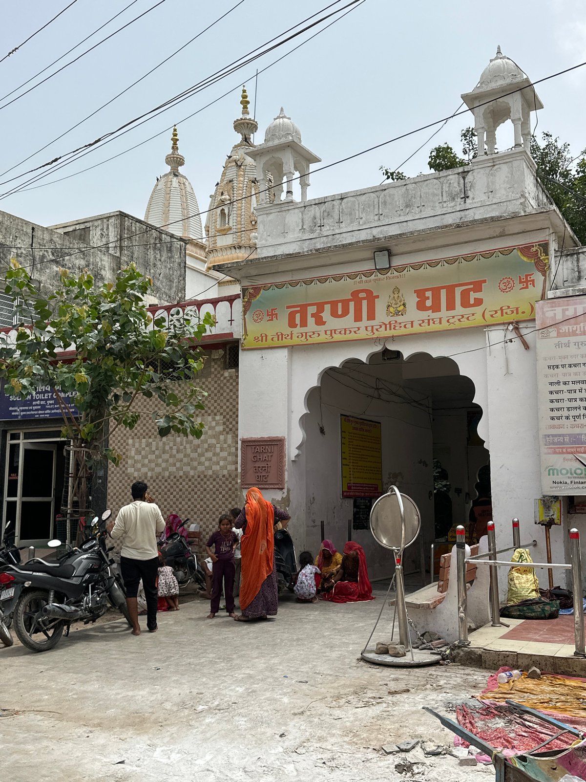 Pushkar bazaar in motion — cows, markets, and temple streets