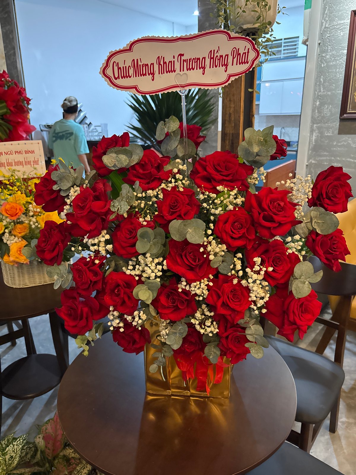 Red roses and a gold-chained dog in Nha Trang