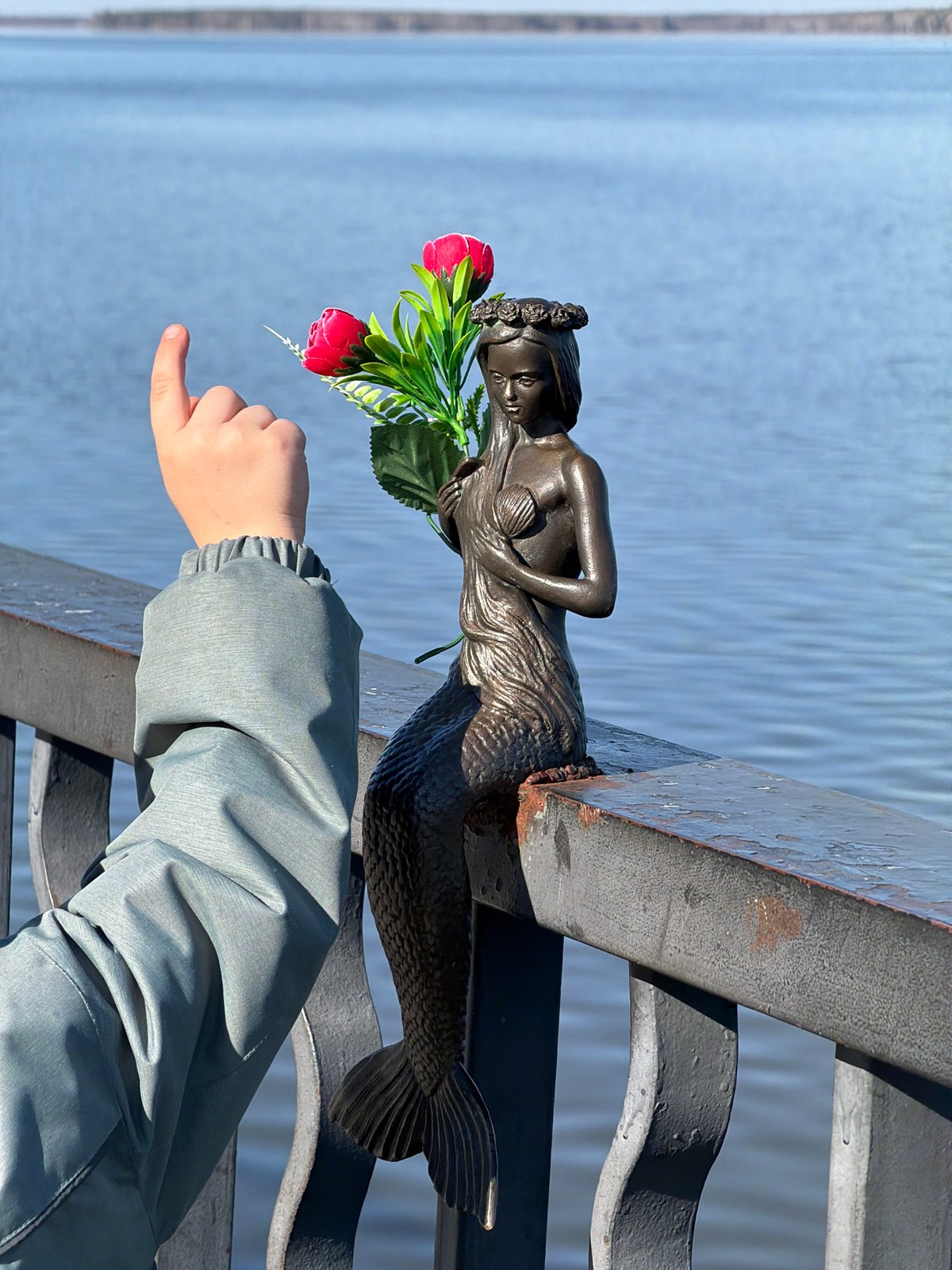Afternoon life captured across Chaikovsky, Russia waterfront and streets