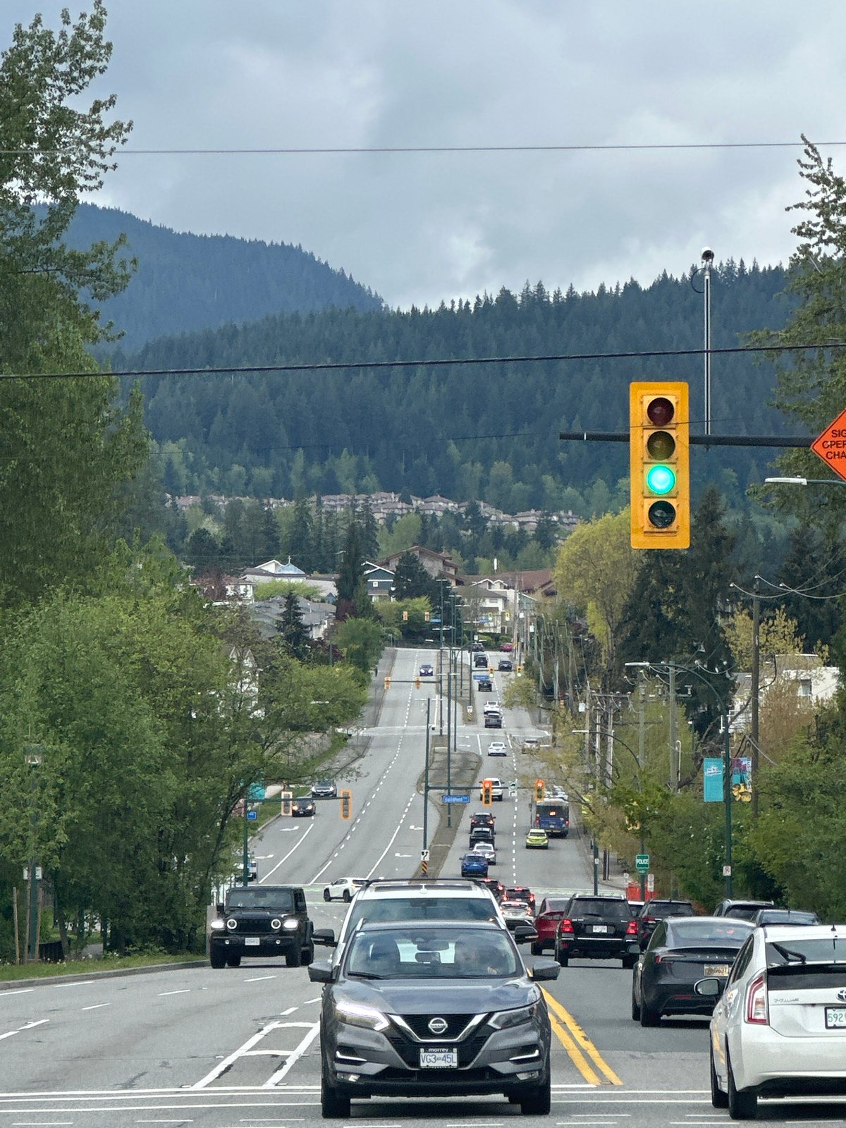 Street scene photographed in Coquitlam with mountain backdrop