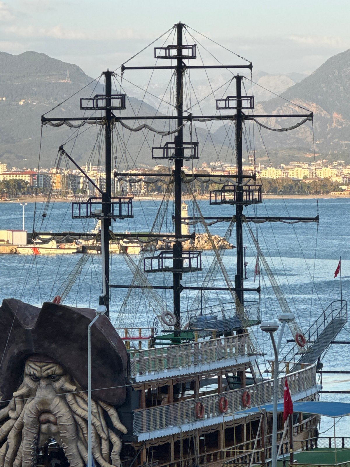 Tourist captures scenic moments around Alanya harbor and cityscape