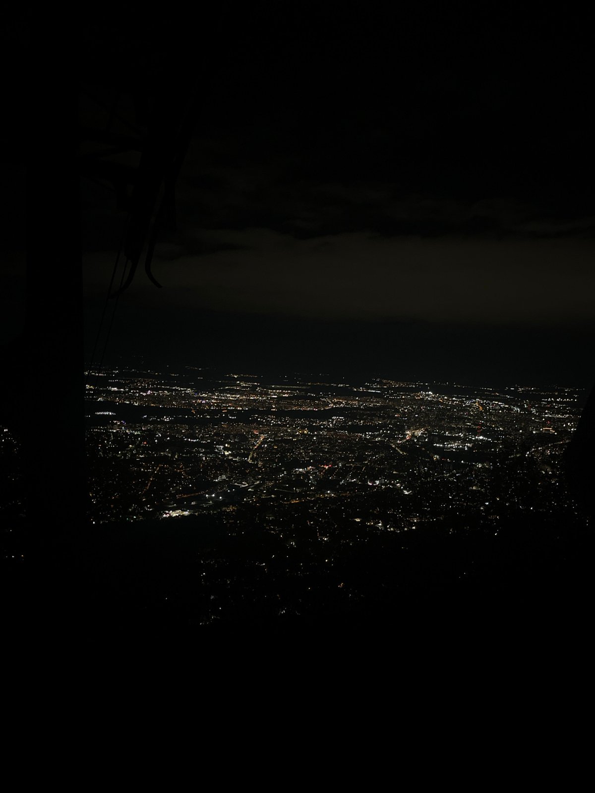 Sofia resident captures moon, city lights through apartment window