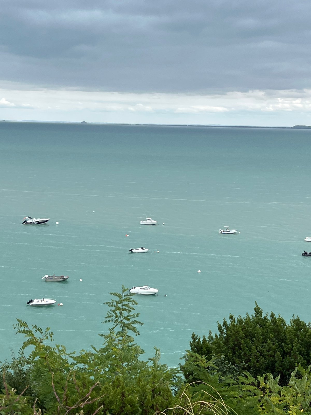 Coastal views and daily life captured in Cancale, France