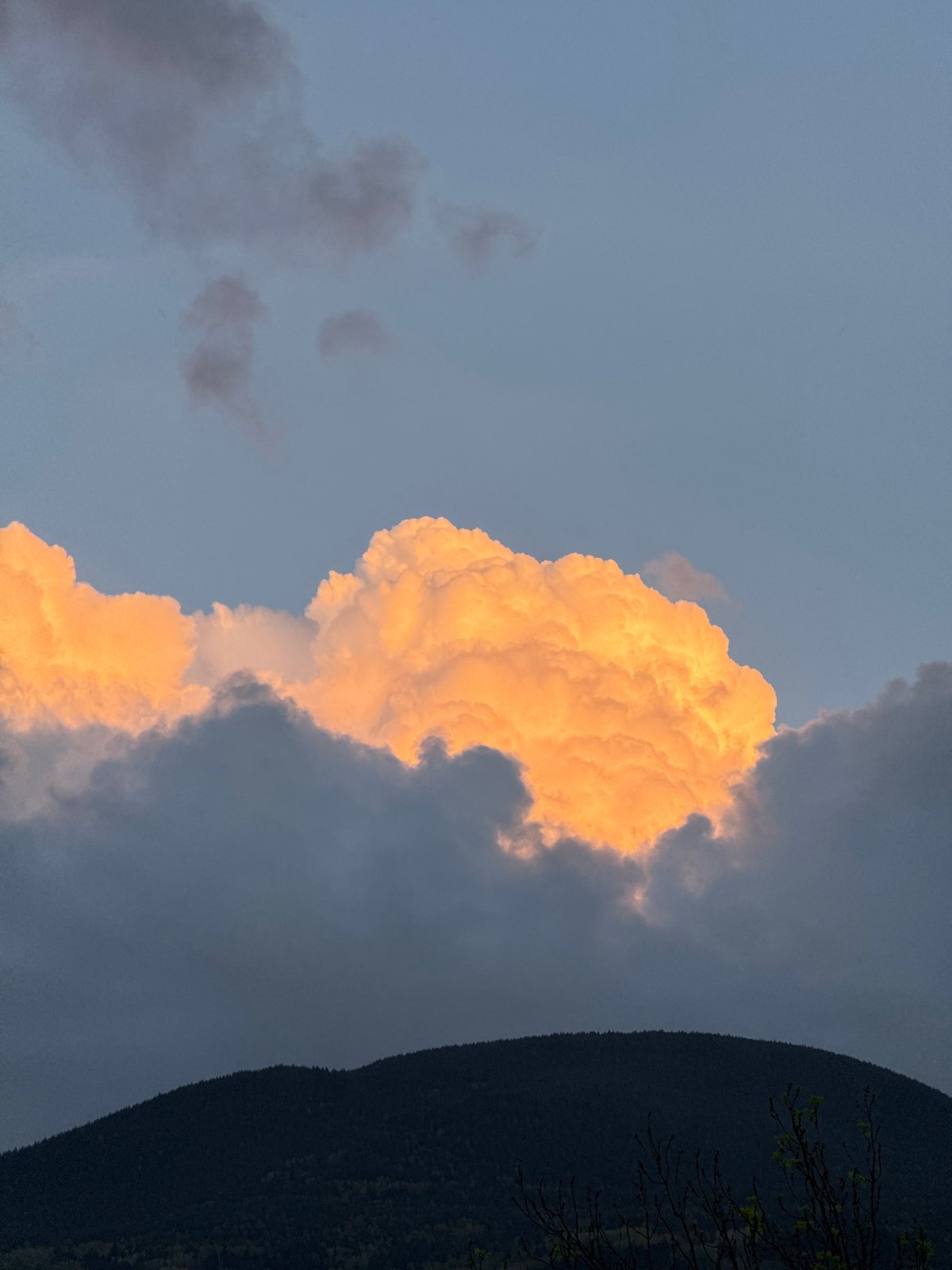Dramatic illuminated cloud formation witnessed at sunset in Benasque
