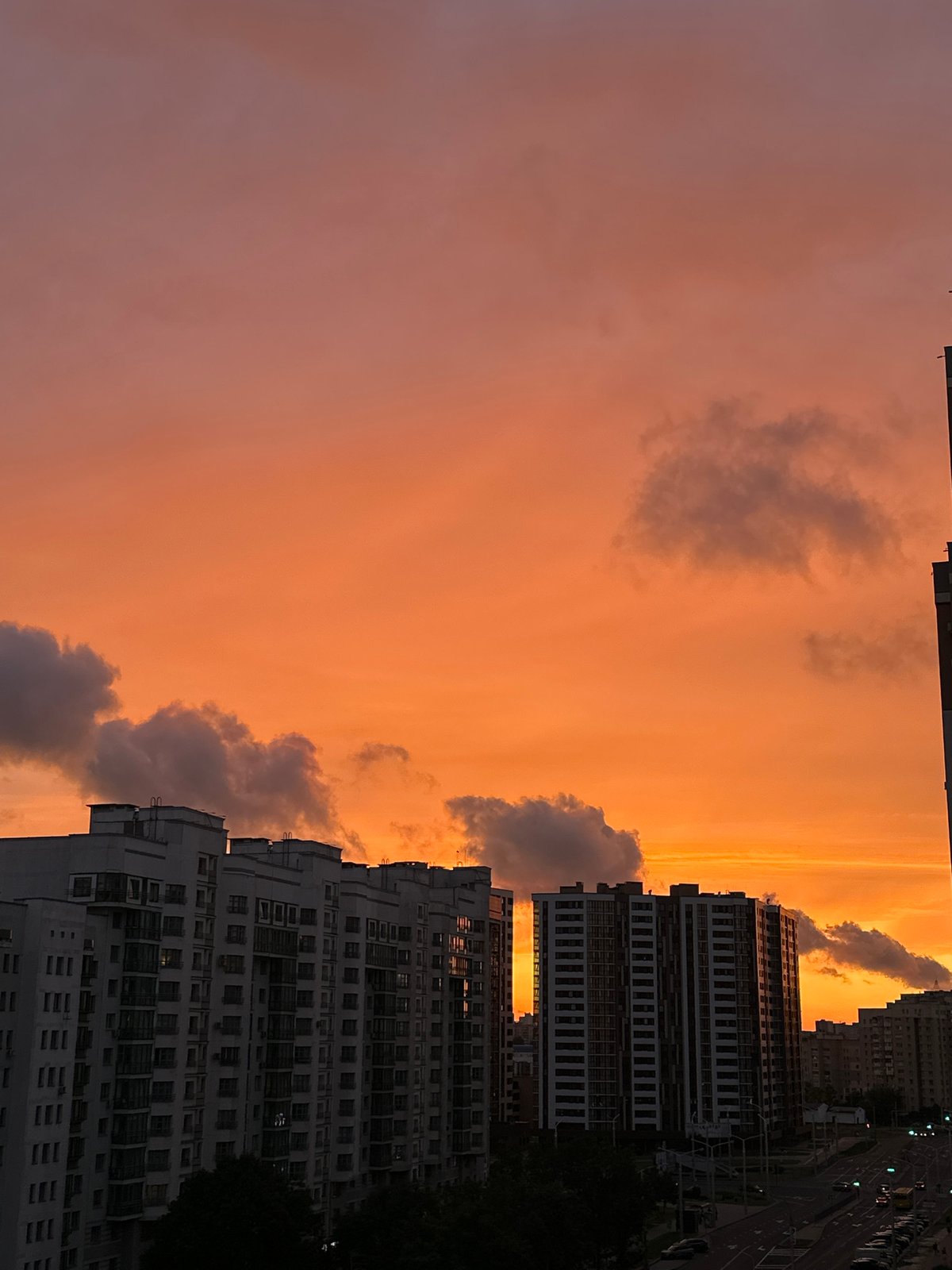 Minsk skyline glows under a dramatic summer sunset