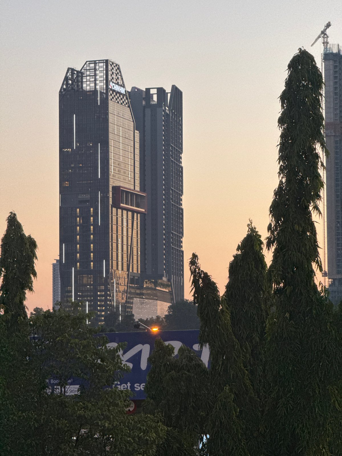 KL skyline at dusk, towers old and new