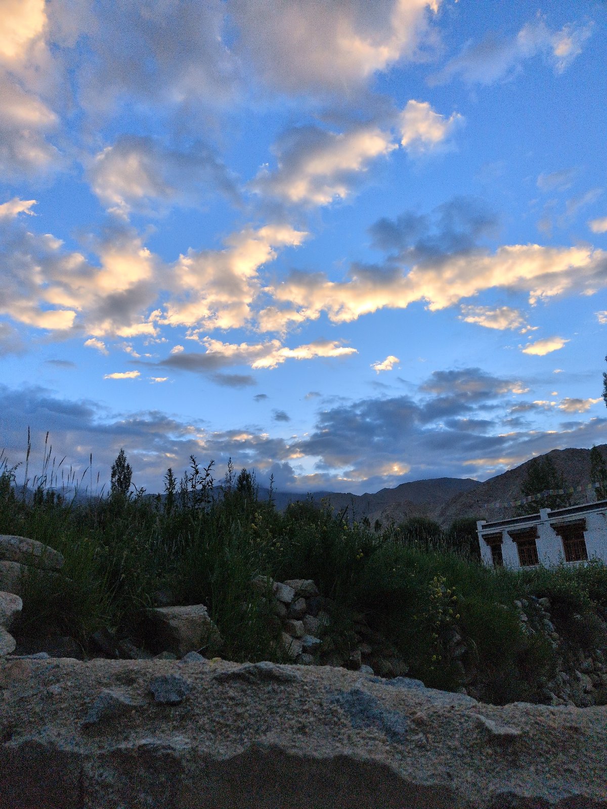 Golden dusk clouds over the Leh skyline