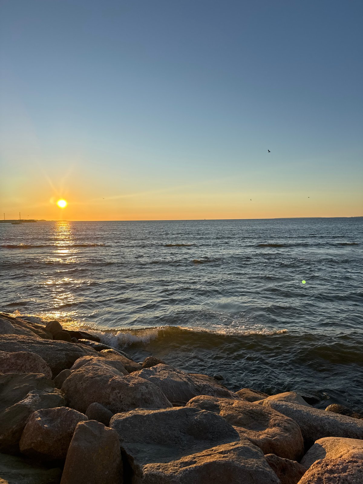 Midsummer sunset along Tallinn's Baltic coast and parks