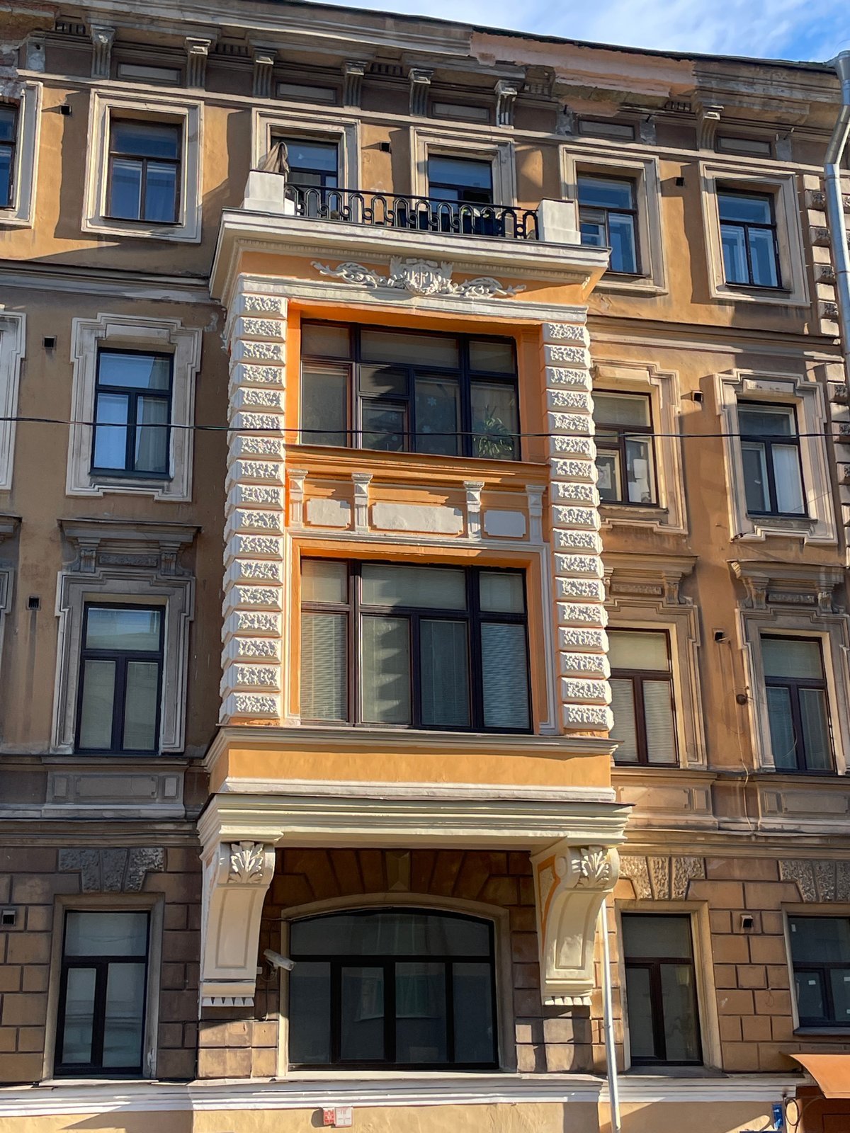 Ornate building photographed under blue skies in Saint Petersburg