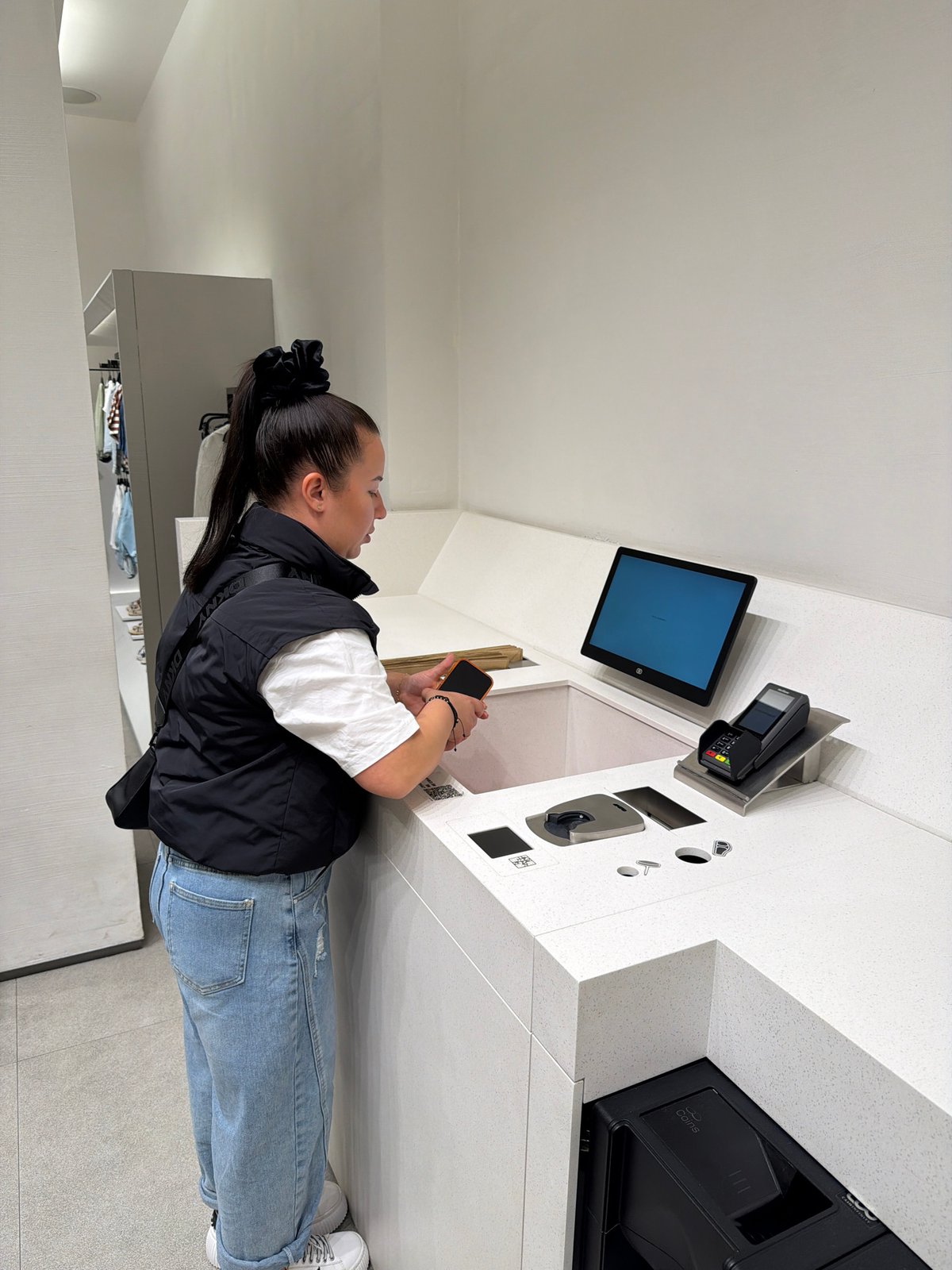 Woman spotted at checkout counter in Burgas, Bulgaria