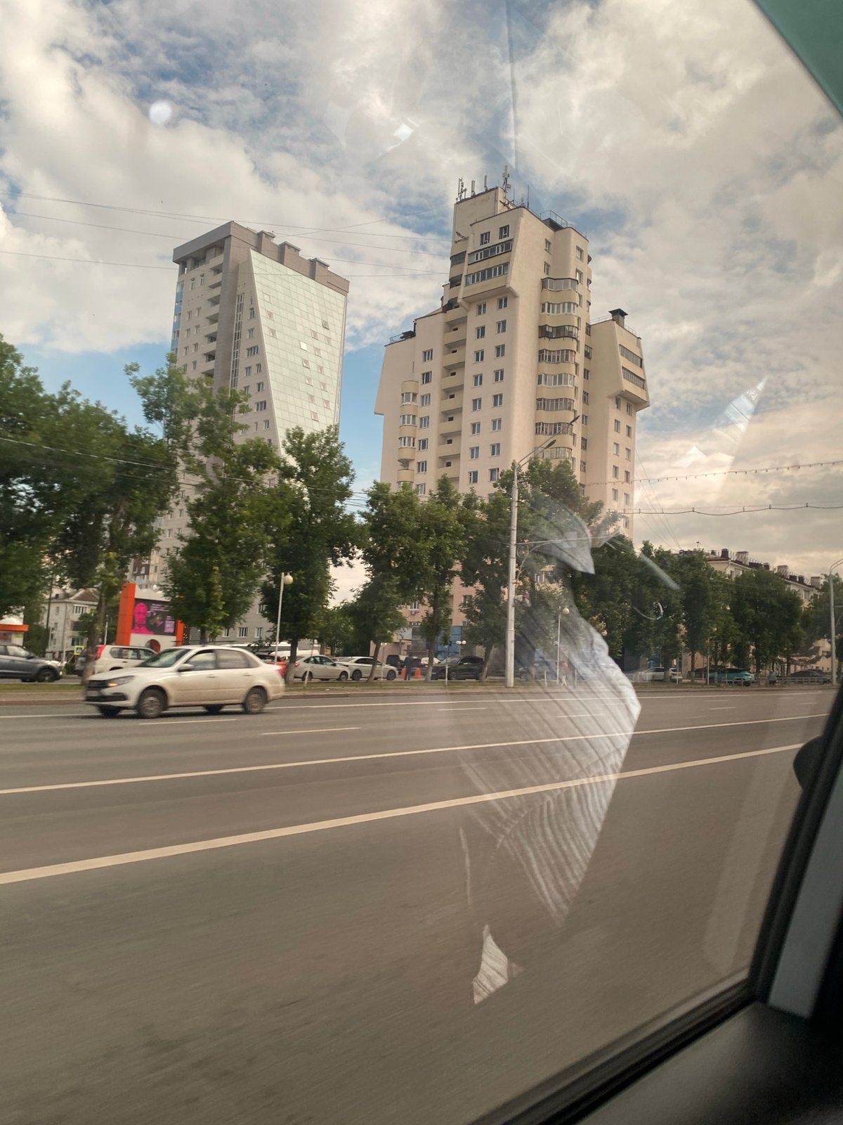 Car journey through Ufa captures modern architecture, passengers