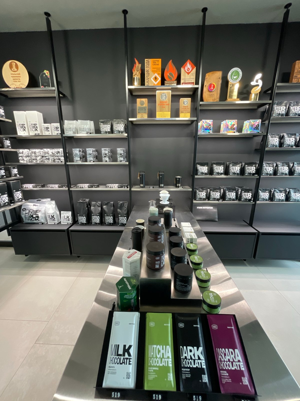 Inside and outside Tasty Coffee's specialty café in Izhevsk