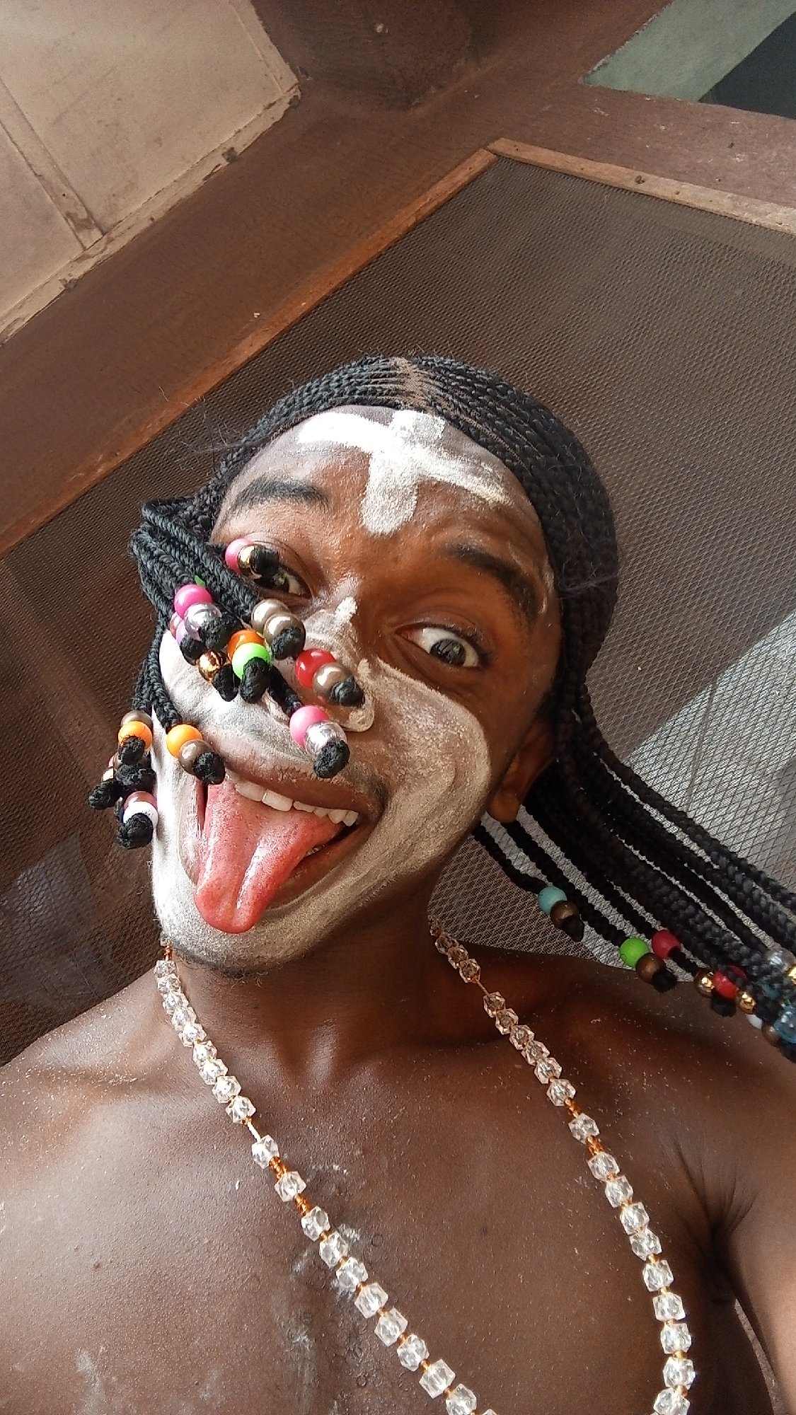 Traditional face painting and daily life documented in Onitsha