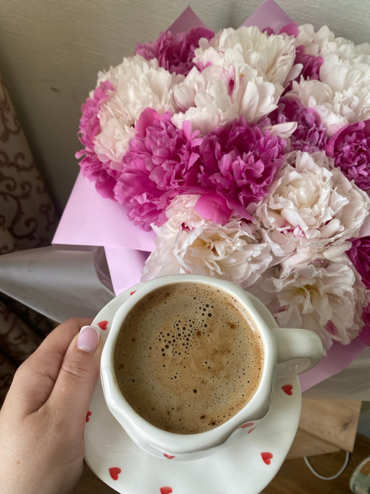 Morning coffee and peonies captured in Sochi