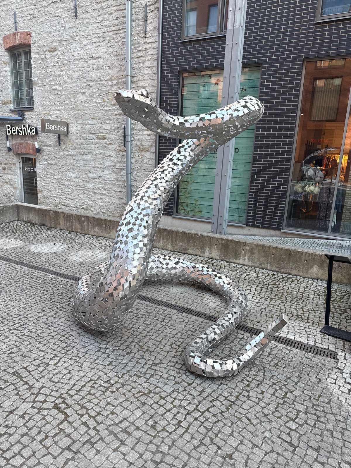 Abstract metal animal sculptures displayed in Tallinn pedestrian area