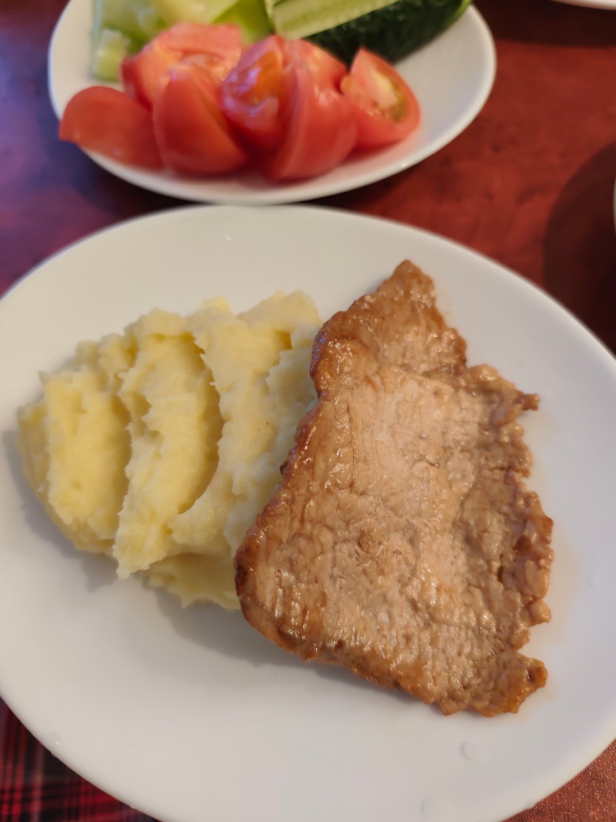 Domestic evening documented in Chaikovsky Russia includes cooking pets