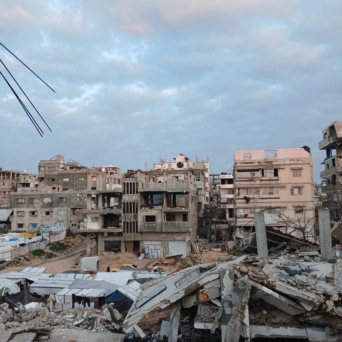 Widespread urban destruction documented across Gaza with temporary shelters