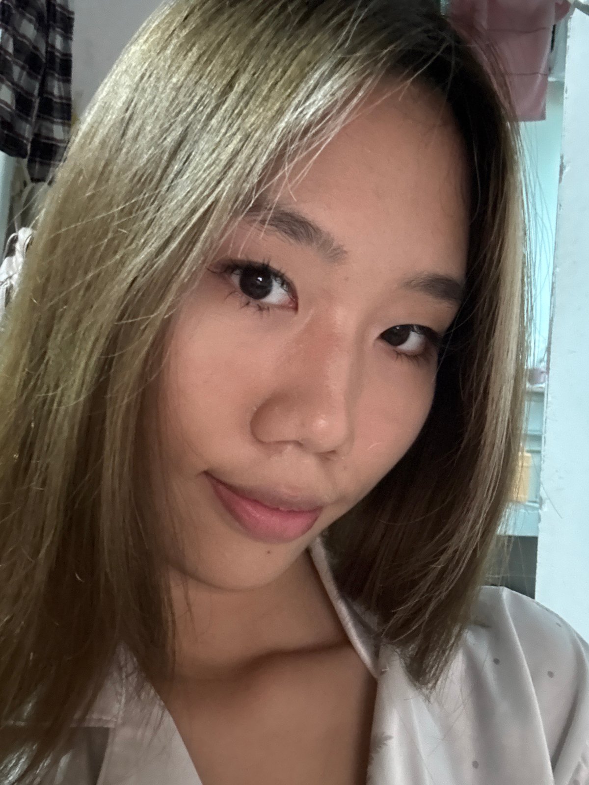 Young woman takes selfie in Nan'an District, China