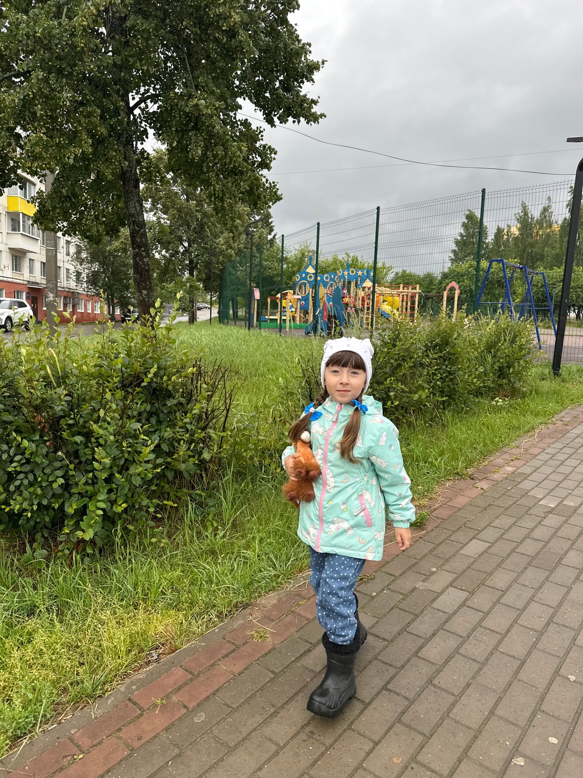 Rainy day out in Chaikovsky: wet streets, flowers, and a kids' café