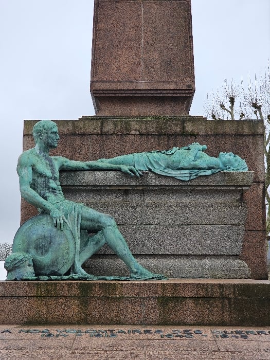 Tourist documents Luxembourg City landmarks during afternoon walking tour