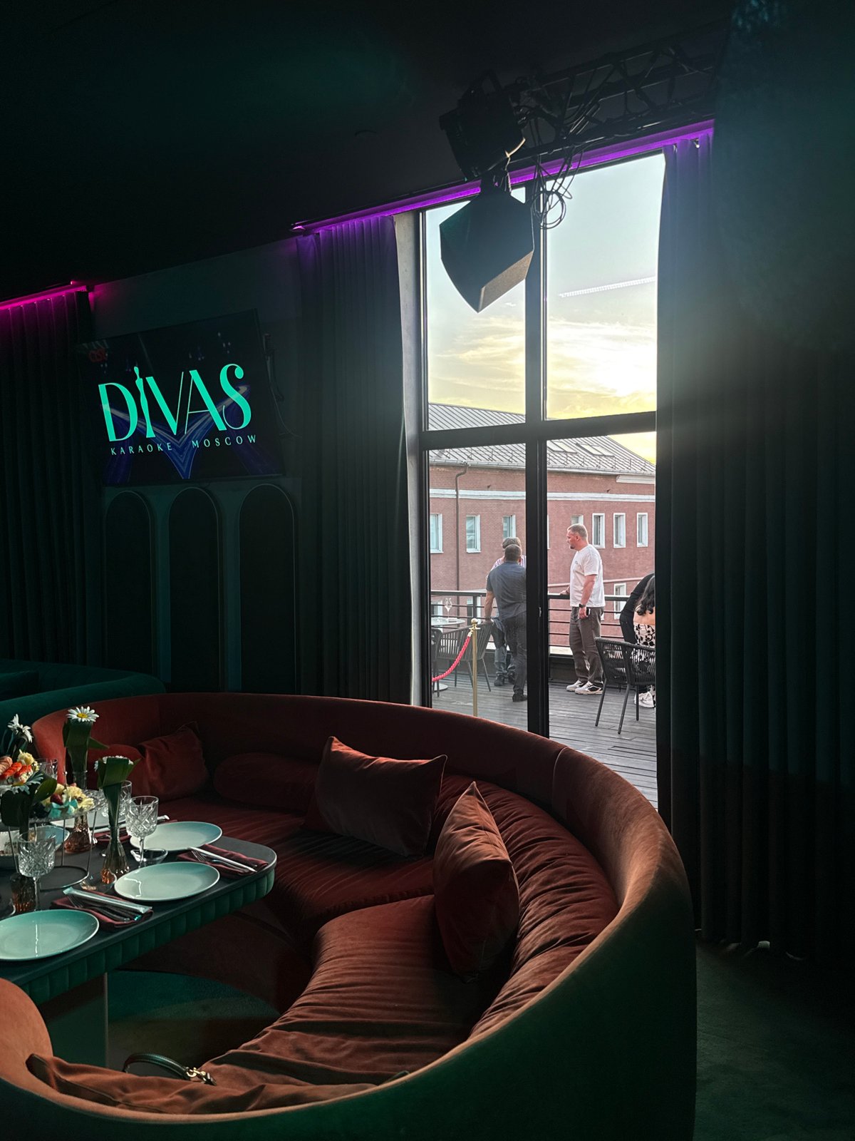 Evening social gathering documented at Moscow karaoke venue