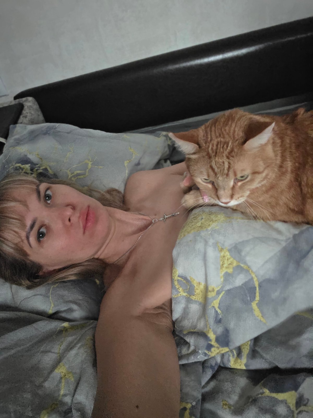 Quiet domestic afternoon captured with woman and cat in Chaikovsky