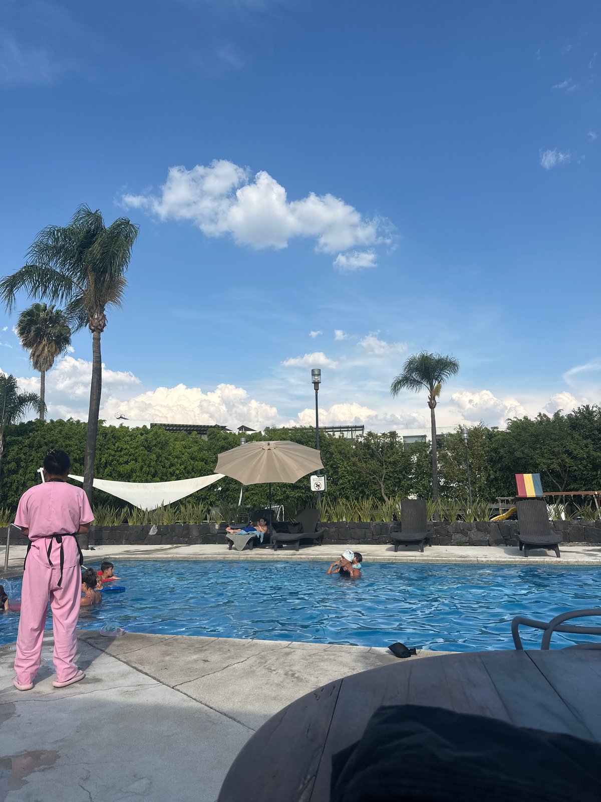 Poolside gathering recorded in San Bernardino Tlaxcalancingo, Mexico