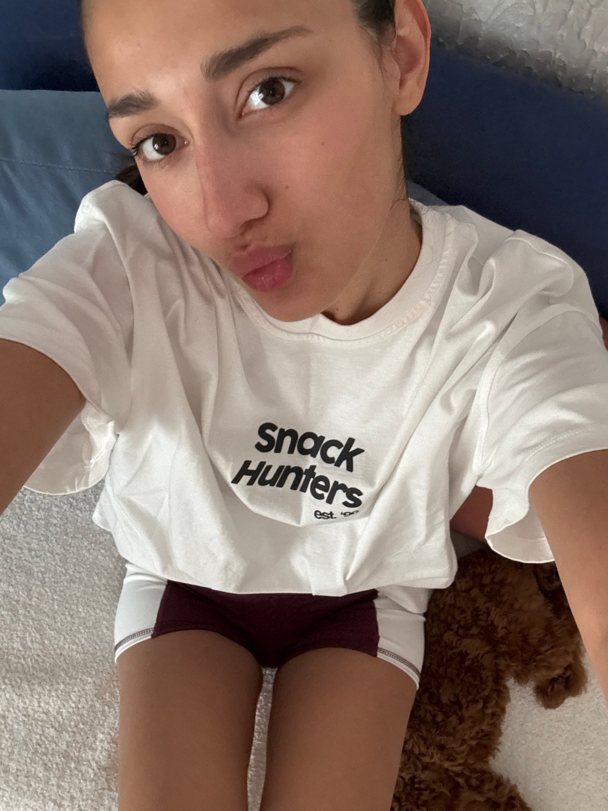 Woman's casual afternoon moments with dog in Sutomore home