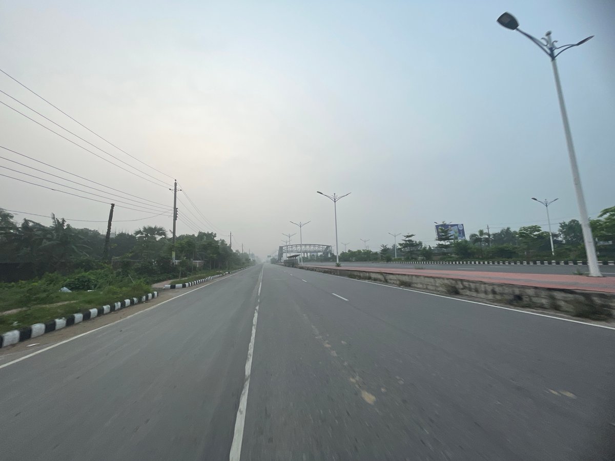 Urban walkthrough documents Purbachal roads and flowering gardens