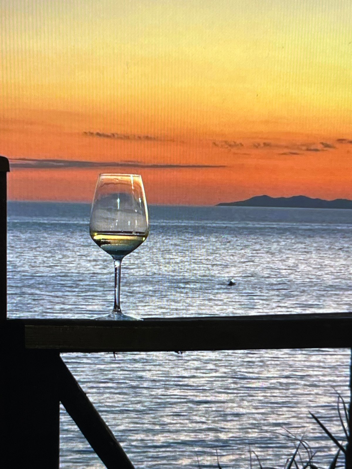 Sunset drinks, ocean swimming, and a seaside dinner for two