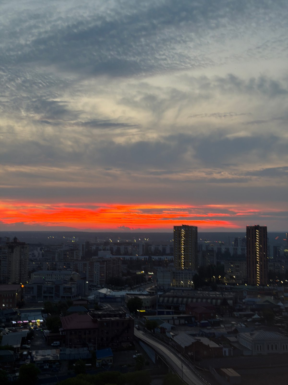 Dramatic sunset colors captured over Perm, Russia cityscape