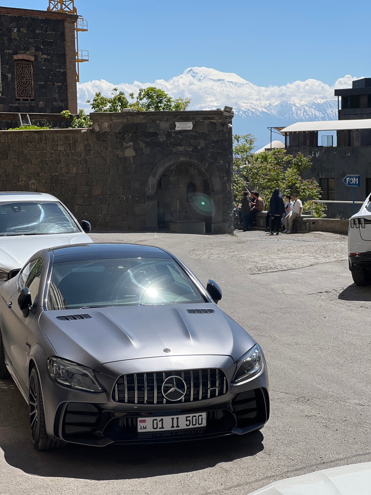 Mercedes and flowers separately documented in Yerevan streets