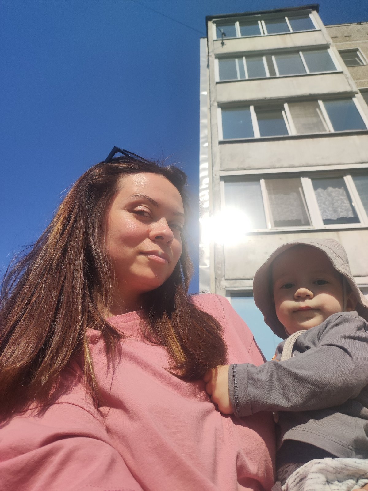 Woman and toddler spend sunny morning together in Chaikovsky