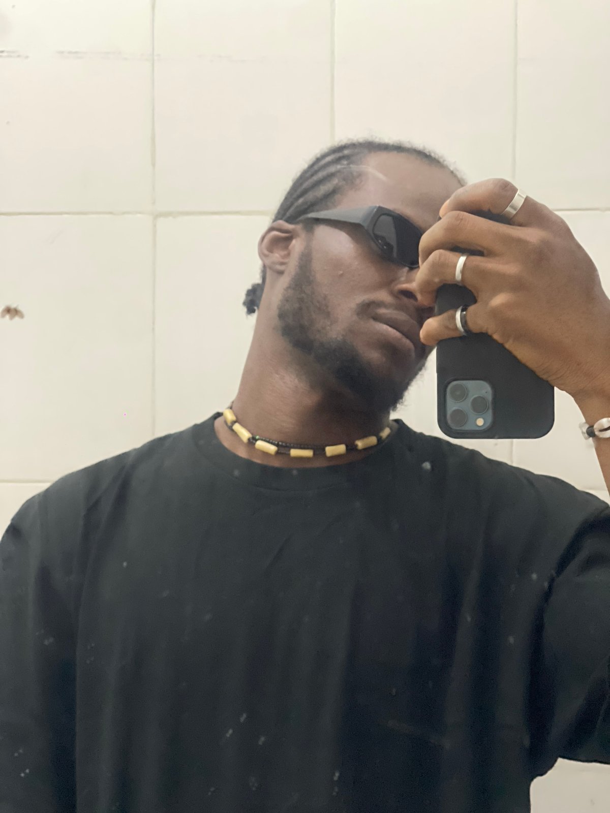 Man takes mirror selfies in Jos, Nigeria