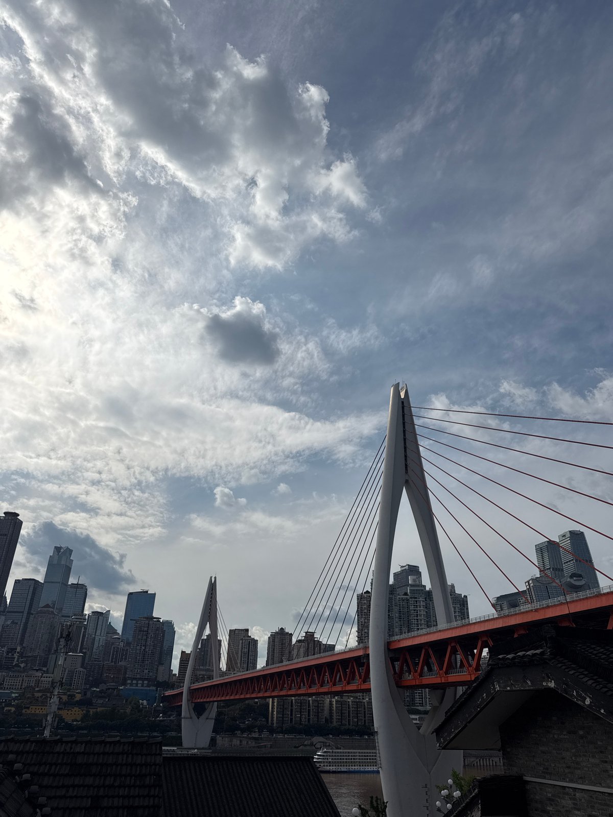 Cable-stayed bridge with white pylons observed in Nan'an District