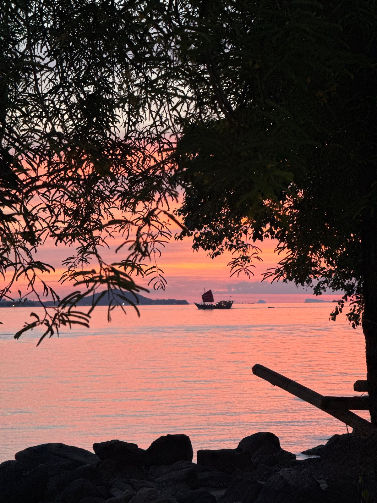 Sunset scenes along the Baan Plai Laem shoreline
