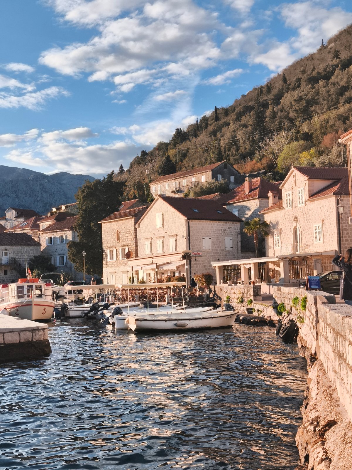 Sunset captured over Bay of Kotor waterfront in Perast