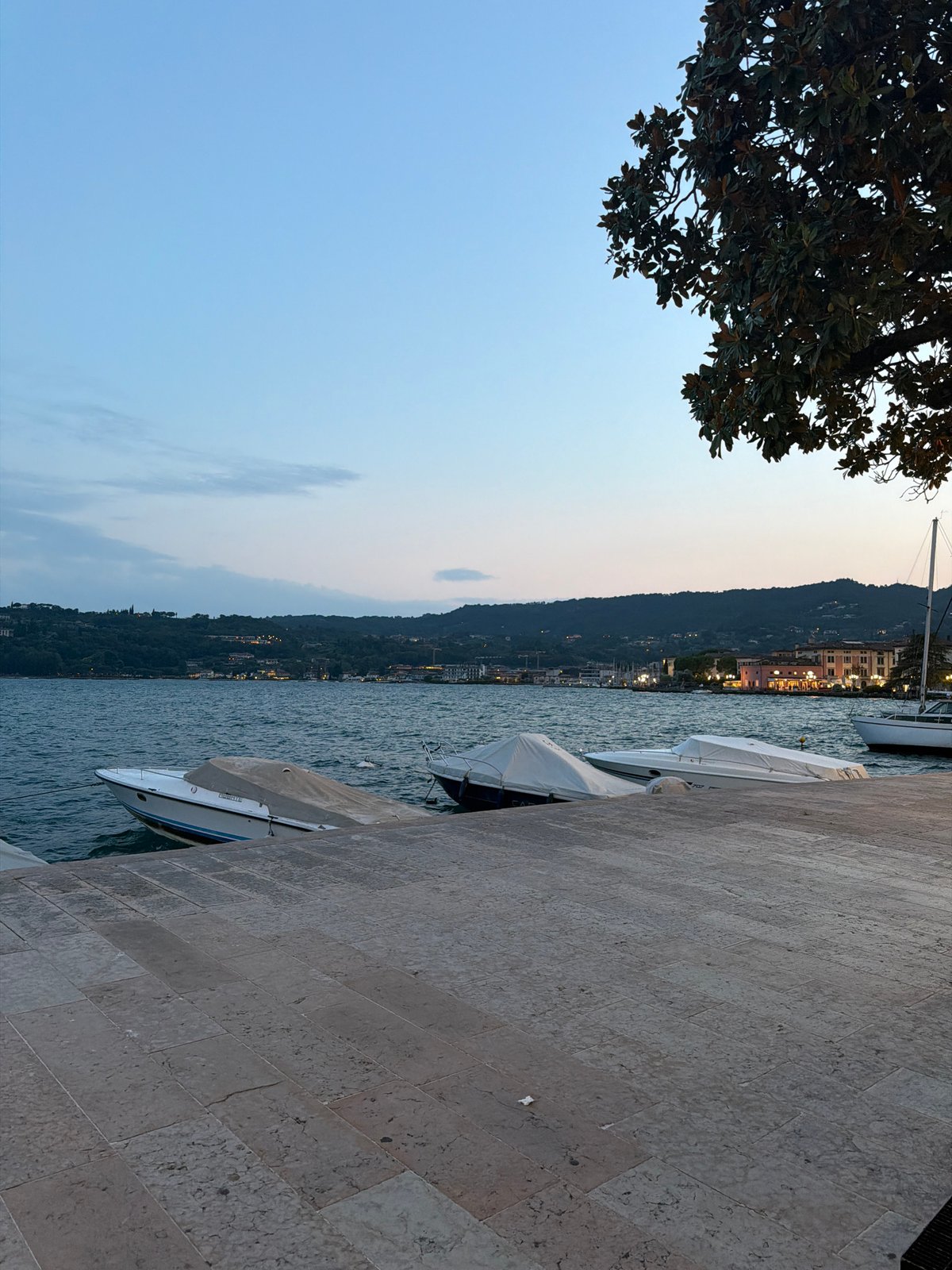Dusk stroll along Salò's boat-lined lakefront promenade