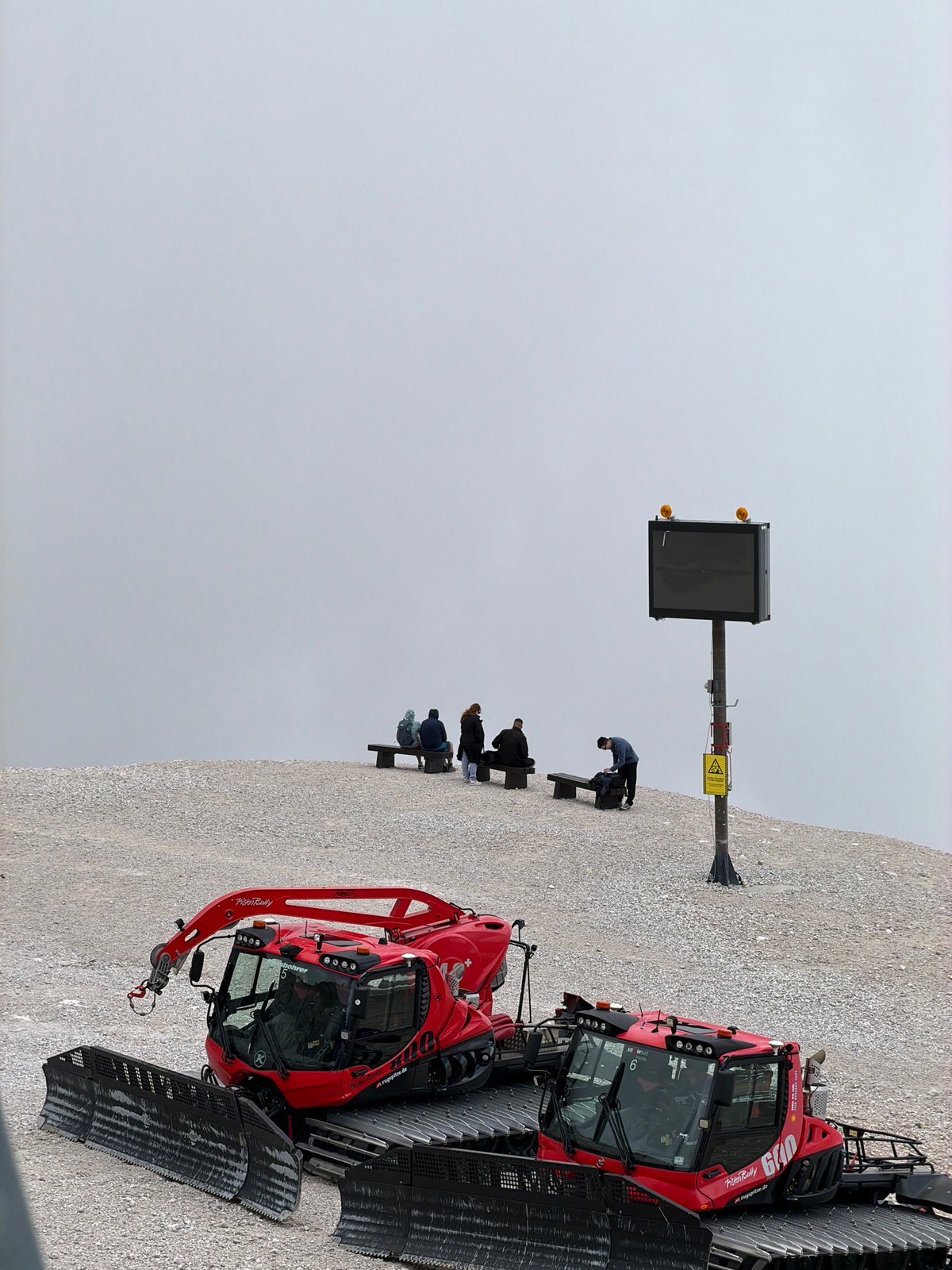 PistenBully snow groomers parked at Germany's highest peak