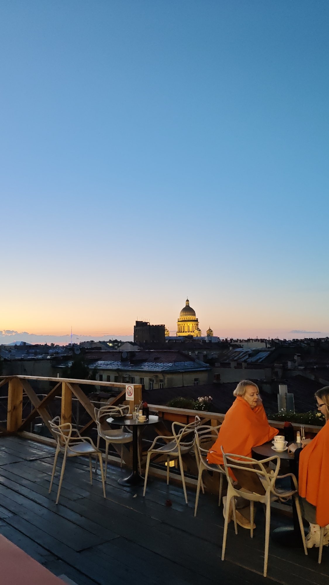 Saint Petersburg rooftops and streets during summer solstice twilight