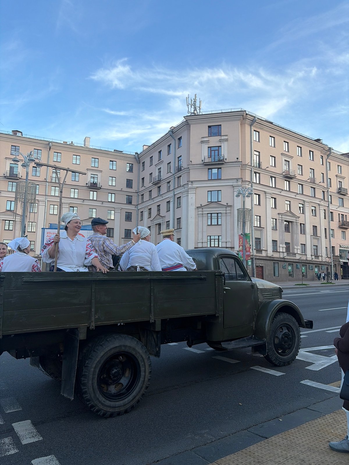 Traditional procession rolls through Minsk on a vintage military truck