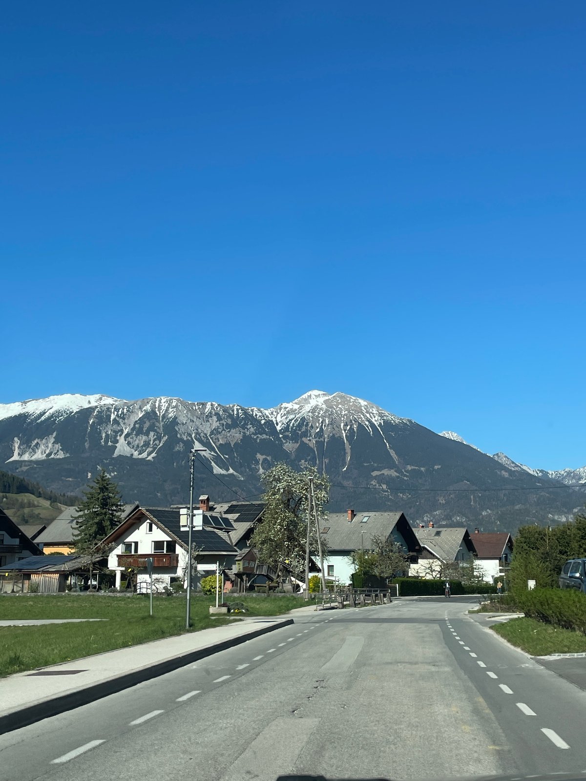 Clear spring day captured on residential street in Bled