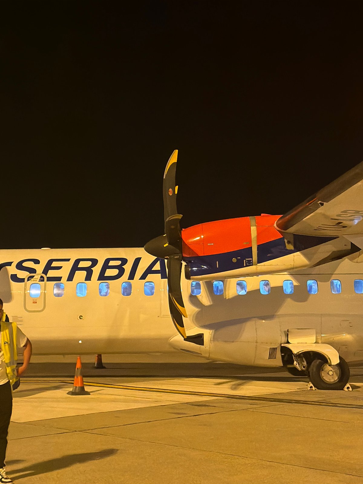 Evening flight operations documented at Podgorica Airport, Montenegro