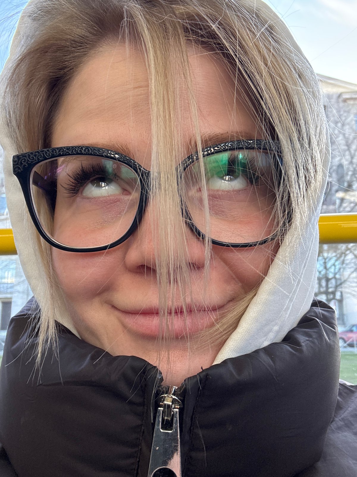 Woman in hooded jacket spotted on Saint Petersburg transit