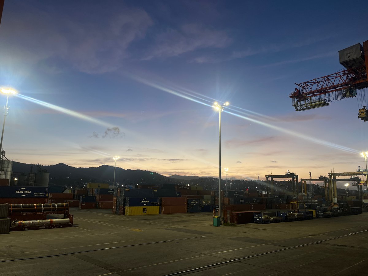 Twilight port operations documented by witnesses at coastal facility