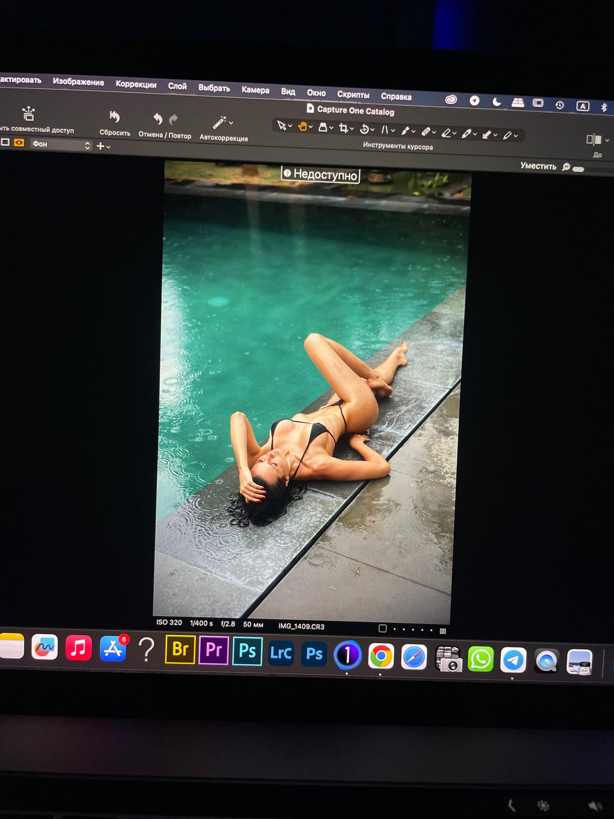 Photo editing session captured on laptop in Kazan