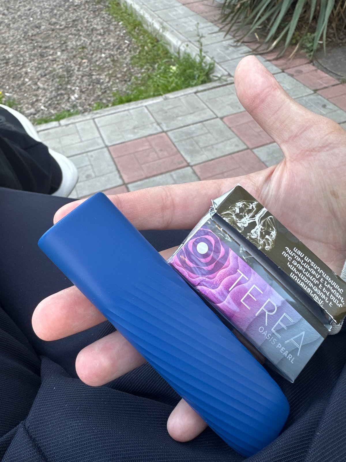 Young man observed at playground with tobacco products present