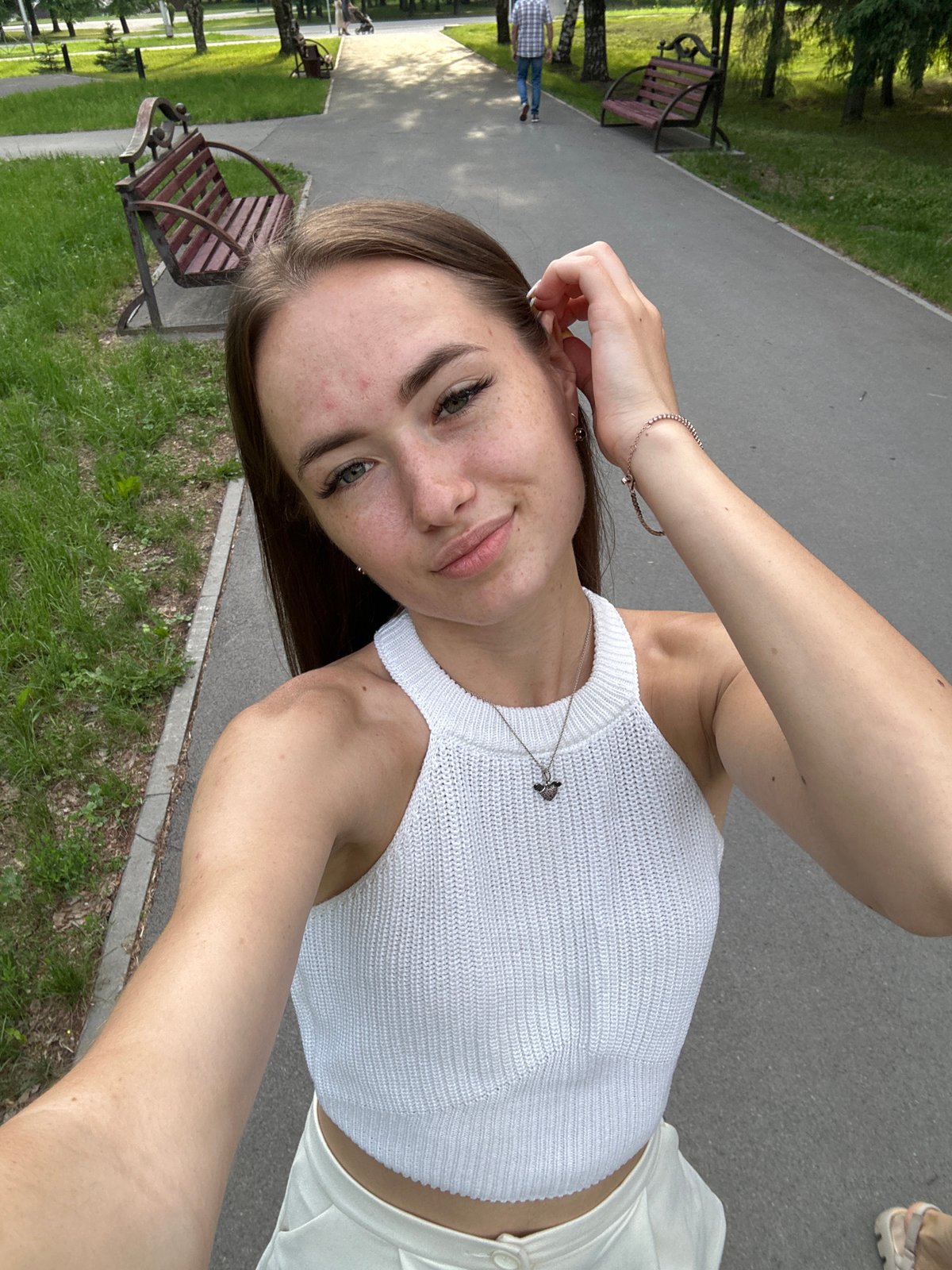Selfie session along park pathway captured from multiple angles